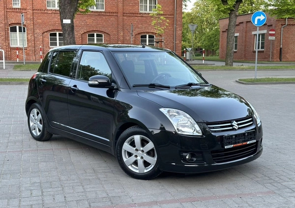 Suzuki Swift cena 16900 przebieg: 121000, rok produkcji 2009 z Gniezno małe 497